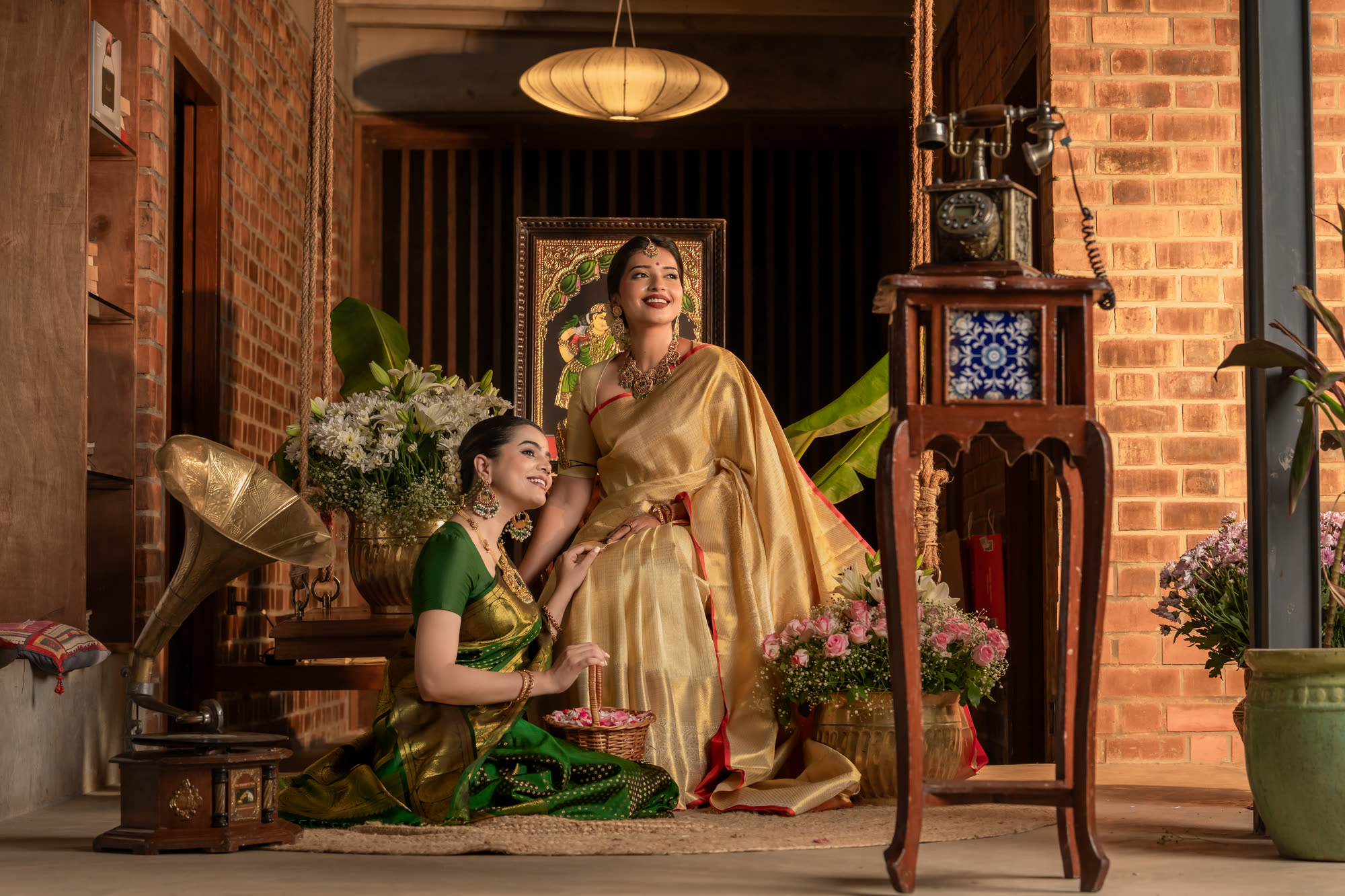 Gold Tissue and Green Kanchivaram Silk Sarees in a Heritage Setting